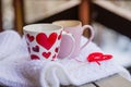Cups of tea or coffee with steam,heart shape on blurred background. Valentine`s day celebration or love concept. Copy Royalty Free Stock Photo