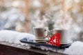 Cups of tea or coffee with steam,heart shape on blurred background. Valentine`s day celebration or love concept. Copy Royalty Free Stock Photo