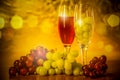 Cups of wine with grapes on a table Royalty Free Stock Photo