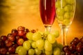Cups of wine with grapes on a table Royalty Free Stock Photo