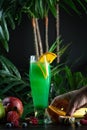 Curacao lemonade in a glass decorated with an orange slice