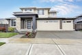 Curb appeal of brand-new home in brown and beige colors