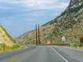 Paved road approaching the Buffalo Bill dam and tunnel, Wyoming`s longest tunnel