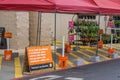 Curbside pickup and social distancing signs outside the Home Depot store during Covid-19 Corona Virus Pandemic