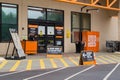 Curbside pickup and social distancing signs outside the Home Depot store during Covid-19 Corona Virus Pandemic