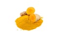 Curcuma powder and roots isolated on white background. Oriental spice