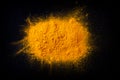 Curcuma turmeric spice powder on black background Royalty Free Stock Photo