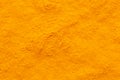 Curcuma turmeric spice powder full frame rough surface Royalty Free Stock Photo