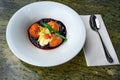 Curd dumplings and ice cream in blueberry sauce Royalty Free Stock Photo