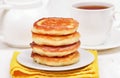 Curd pancakes stack and tea Royalty Free Stock Photo