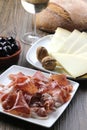 Cured iberian ham and cheese tapas