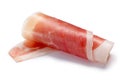 Cured meat ham jamon slice rolled up, paths Royalty Free Stock Photo