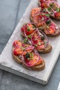 Cured salmon gravlax on a crusty bread Royalty Free Stock Photo