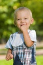 Curious baby boy in the park Royalty Free Stock Photo