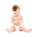 Curious baby brushing teeth Royalty Free Stock Photo