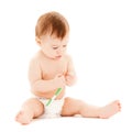 Curious baby brushing teeth Royalty Free Stock Photo