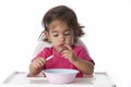 Curious baby girl is testing her fork Royalty Free Stock Photo