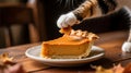 Curious Cat Paw Playfully Reaching for a Slice of Pumpkin Pie Royalty Free Stock Photo