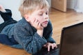 Curious child browsing the internet Royalty Free Stock Photo