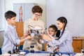 Happy children learn programming using laptops on extracurricular classes Royalty Free Stock Photo