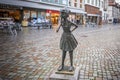 The Curious Girl Statue by Bernhard Kleinhans (Die Neugierige) - Hamelin, Germany Royalty Free Stock Photo