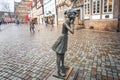 The Curious Girl Statue by Bernhard Kleinhans (Die Neugierige) - Hamelin, Germany Royalty Free Stock Photo