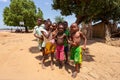 Curious group of children looking at a tourist near the river Mania. Port Bac Belo Sur Tsiribihina, Madagascar Royalty Free Stock Photo