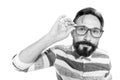 Curious Hipster in glasses on white background. Fish-eye portrait of bearded guy in glasses. Surprised poindexter on white. Nerd g Royalty Free Stock Photo