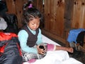 Curious little girl exploring things of tourist - Nepal