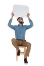 Curious man sitting with an empty message sign up