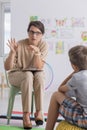 Curious patient listens to his psychologist Royalty Free Stock Photo