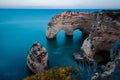 Incredible rock arches formed by nature on the Portuguese Algarve coast.