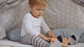 curious toddler boy sitting in baby Royalty Free Stock Photo