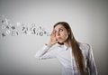 Curious woman in white and letters