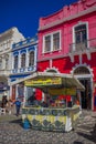CURITIBA ,BRAZIL - MAY 12, 2016: little food stand located in front of a beautifull red house