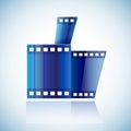 Curled blue cinema tape film human hand with thumb