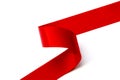Curled Red Ribbon over White Background