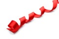 Curled red ribbon on white background Royalty Free Stock Photo