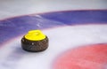 Curling Stone on Ice Royalty Free Stock Photo