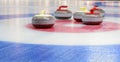 Curling stones Royalty Free Stock Photo