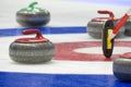 Curling stones Royalty Free Stock Photo