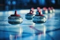 curling stones on ice Royalty Free Stock Photo