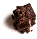 Curls and pieces of tasty chocolate Royalty Free Stock Photo