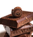 Curls and pieces of tasty chocolate Royalty Free Stock Photo