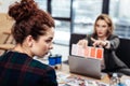 Curly assistant feeling uncomfortable with strict female boss