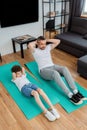 Curly and bearded father working out