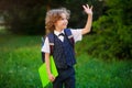 Curly blond student goes to school Royalty Free Stock Photo