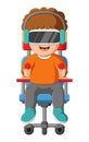 The curly boy is playing virtual reality game console on chair