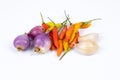 curly chili and red onion, shallots isolated on a white background Royalty Free Stock Photo