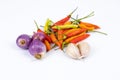 curly chili and red onion, shallots isolated on a white background Royalty Free Stock Photo